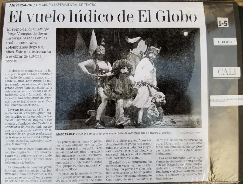 Picture of the front page of a newspaper with an image of five actors mid-scene.